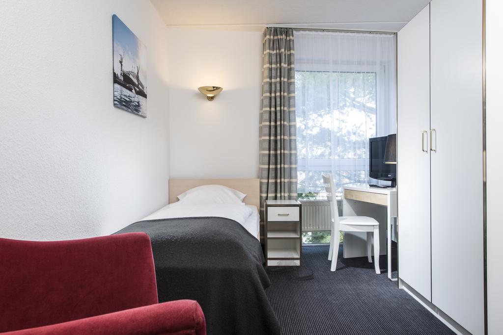 City Inn Hotel Leipzig Quarto foto